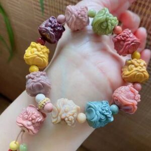 High-quality exquisitely carved colorful Alashan agate lucky lion head for DIY bracelets, brings good luck, wealth and wards off evil spirits.